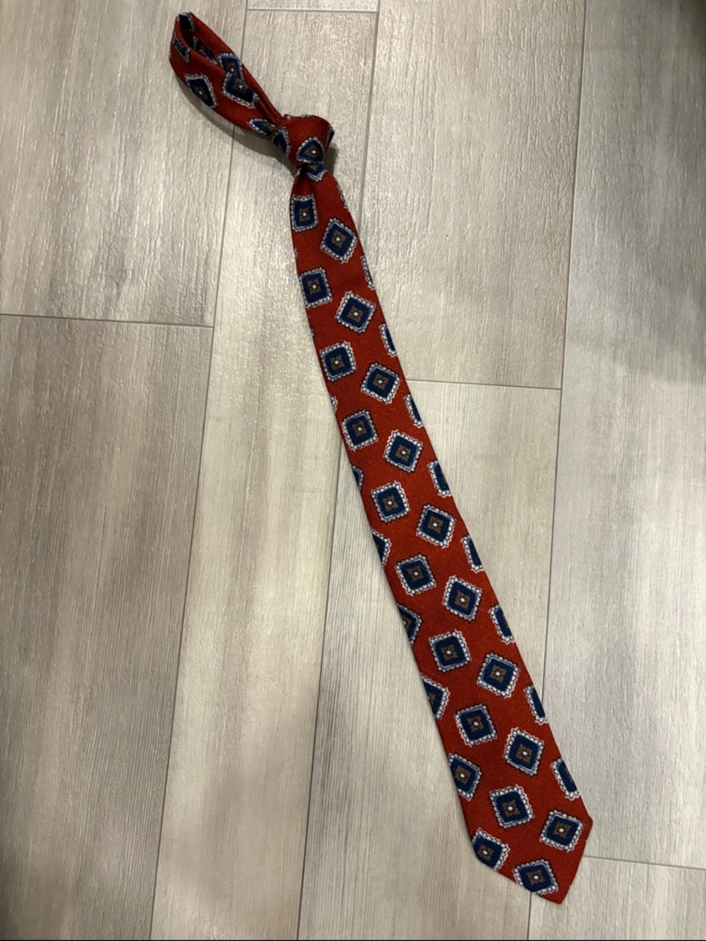 Suitsupply Burnt Orange Tie with Navy and White Geometric Medallions